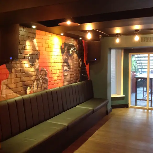 Bar and restaurant interior with banquette seating